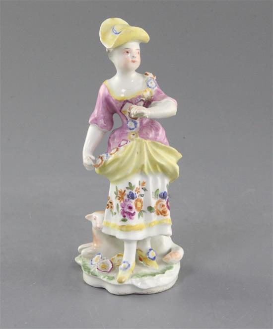 A Derby figure of a shepherdess, c.1760, h. 14cm, left wrist, hat brim and sheep front legs restored
